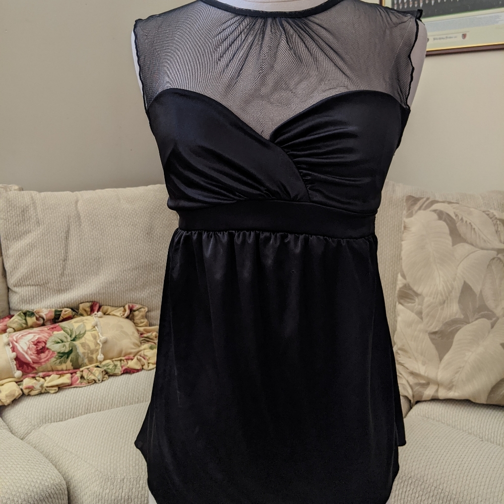 Elegant sheer and shiny dressy black top